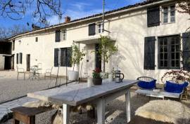 €106450 - Attractive Stone Property With A Cottage To Renovate