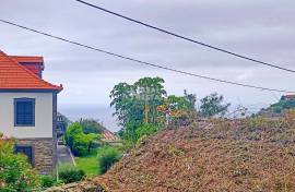 Haystacks with sea and mountain views