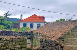 Haystacks with sea and mountain views