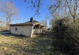 Maison de plein pied avec grange attenante