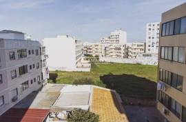 Urban land with 6430 m2 and approved PIP located next to Rotunda do Cubo in Olhão.