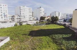 Urban land with 6430 m2 and approved PIP located next to Rotunda do Cubo in Olhão.