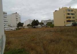 Urban land with 6430 m2 and approved PIP located next to Rotunda do Cubo in Olhão.