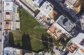 Urban land with 6430 m2 and approved PIP located next to Rotunda do Cubo in Olhão.