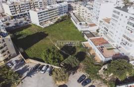 Urban land with 6430 m2 and approved PIP located next to Rotunda do Cubo in Olhão.