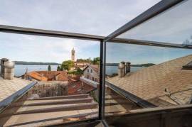 Elegant attic for sale in Lesa