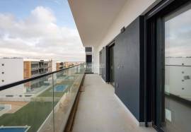 New 3 bedroom apartment on the 3rd and top floor of a luxury condominium with swimming pool located in Sesmarias, Alvor, Portimão