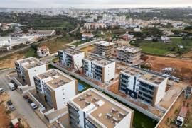 New 3 bedroom apartment on the 3rd and top floor of a luxury condominium with swimming pool located in Sesmarias, Alvor, Portimão