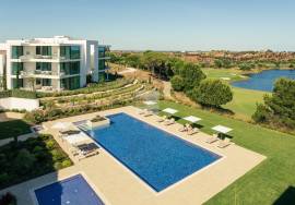 Modern apartment in Monte Rei, overlooking the Atlantic and golf course.