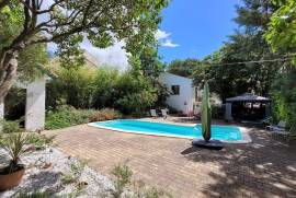 Very Pretty Renovated Village House Offering 110 M2 Living Space On 639 M2 Of Land With Swimming Pool And Outbuildings.