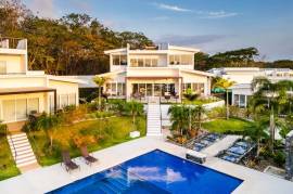 The Enclave: Ultra-Modern 5 Bedroom Villa Located Minutes From the Beach!