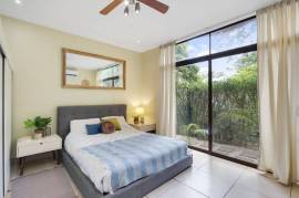 2 Bedroom Garden Oasis Condo Close to the Beach: Near the Coast Condominium For Sale in Playa Tamarindo