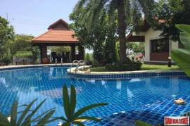 A private compound with a pool villa, a second house and more in Nakhon Pathom.