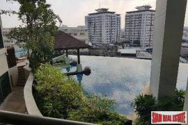 Sky Walk Condo - City Views from this One Bedroom + Study Room in Phra Khanong