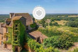 A typical house from the 14th century at the foot of Chateau de Biron