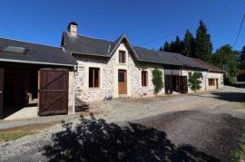 HAUTE VIENNE. Near EYMOUTIERS. Beautifully renovated 3 bedroom stone house with gite, outbuildings, lake and land of 16 839m2.