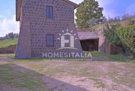 Renovated farmhouse with outbuilding