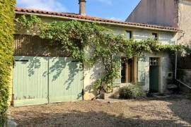 €249950 - Attractive Stone Property with Gite, Swimming Pool And Outbuildings