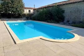 €249950 - Attractive Stone Property with Gite, Swimming Pool And Outbuildings