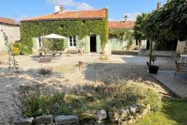 €249950 - Attractive Stone Property with Gite, Swimming Pool And Outbuildings