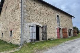 Beautiful stone barn convertible into a house and adjoining land