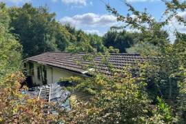 Secluded Bungalow To Renovate In A Superb Wooded Setting