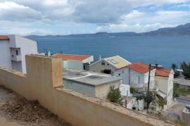 Second floor half-finished apartment just 160meters from the sea in Sitia.