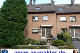 Maisonette-Wohnung mit Garten und 2 Garagen 