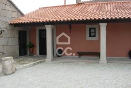 Typical Restaurant, in stone, with surrounding vineyard plantation in a village near Chaves