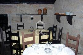 Typical Restaurant, in stone, with surrounding vineyard plantation in a village near Chaves