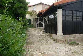 Typical Restaurant, in stone, with surrounding vineyard plantation in a village near Chaves