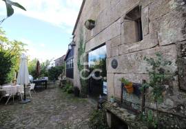 Typical Restaurant, in stone, with surrounding vineyard plantation in a village near Chaves