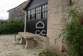 Typical Restaurant, in stone, with surrounding vineyard plantation in a village near Chaves