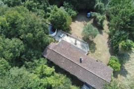 €70000 - Secluded Bungalow to Renovate in a Superb Wooded Location!