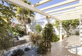 Tavira: 4-Bedroom House with Sea Views, Garden, and Garage in a Quiet Residential Area