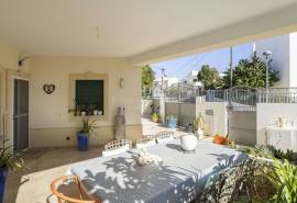 Tavira: 4-Bedroom House with Sea Views, Garden, and Garage in a Quiet Residential Area