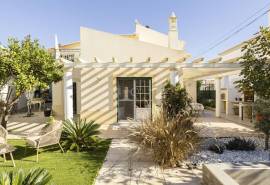 Tavira: 4-Bedroom House with Sea Views, Garden, and Garage in a Quiet Residential Area