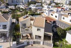 Tavira: 4-Bedroom House with Sea Views, Garden, and Garage in a Quiet Residential Area