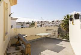 Tavira: 4-Bedroom House with Sea Views, Garden, and Garage in a Quiet Residential Area