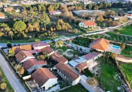 Building land with annexes on the outskirts of the city