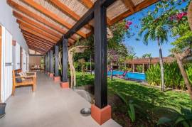 Hotel Mapache: Garden Oasis with 7 Rental Units and 2 Pools - Prime Investment Opportunity!